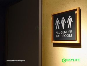 designed by benc engraved metal all gender restroom sign with framed
